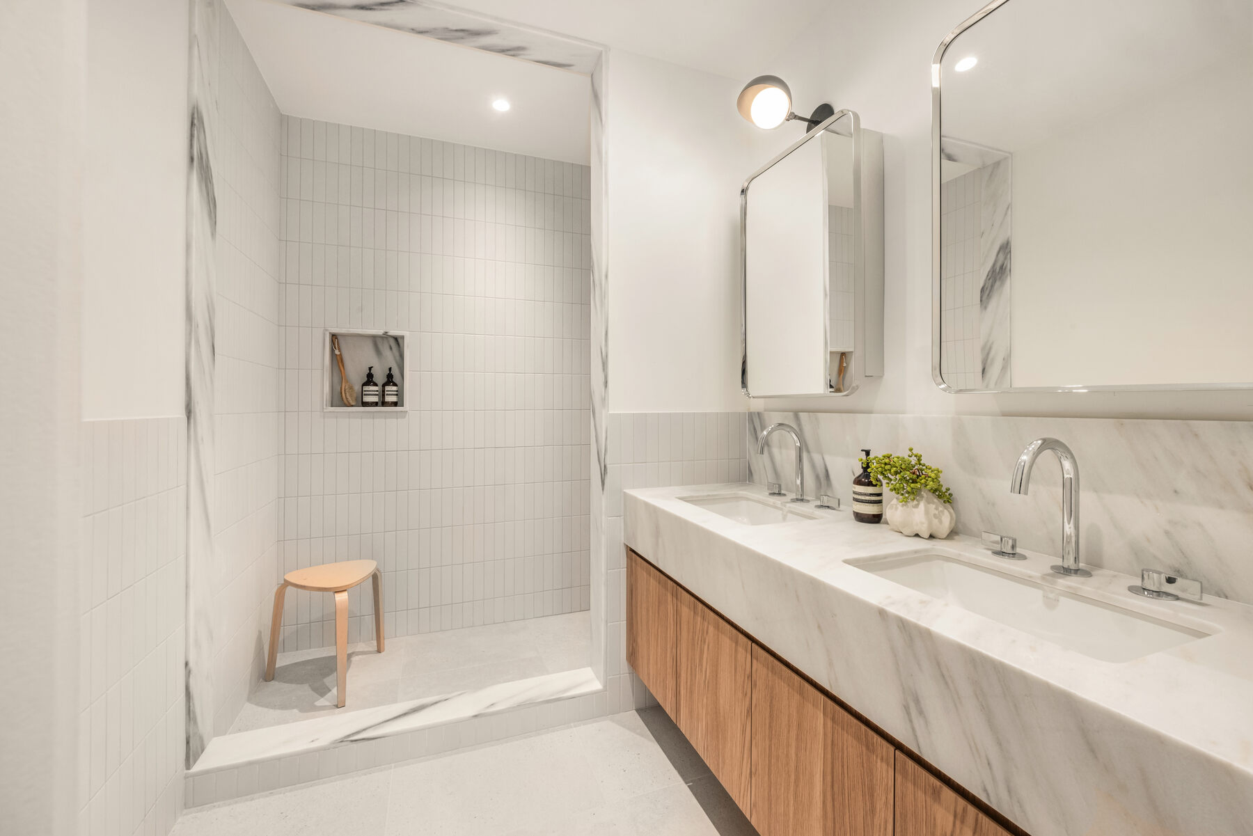 Marble bathroom with oak vanity at 34 Garfield Place