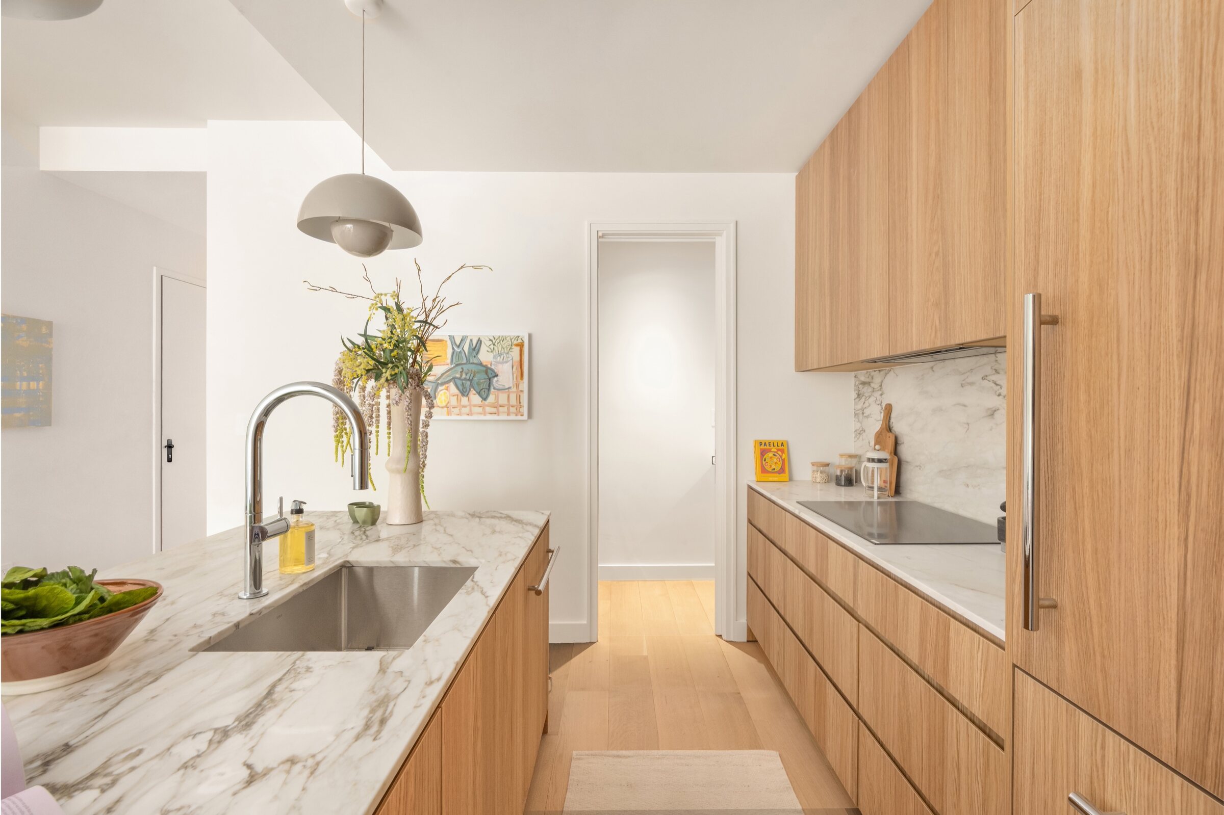 Galley view of the oak and marble kitchen at 34 Garfield Place