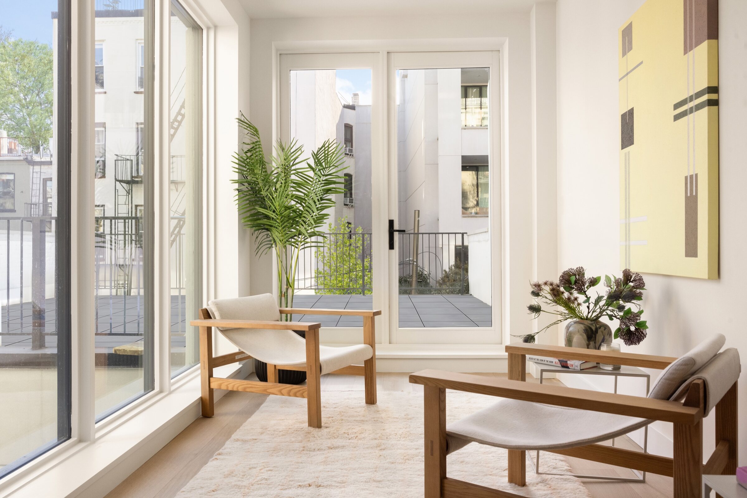 Sunlit seating area opening to a terrace at 34 Garfield Place