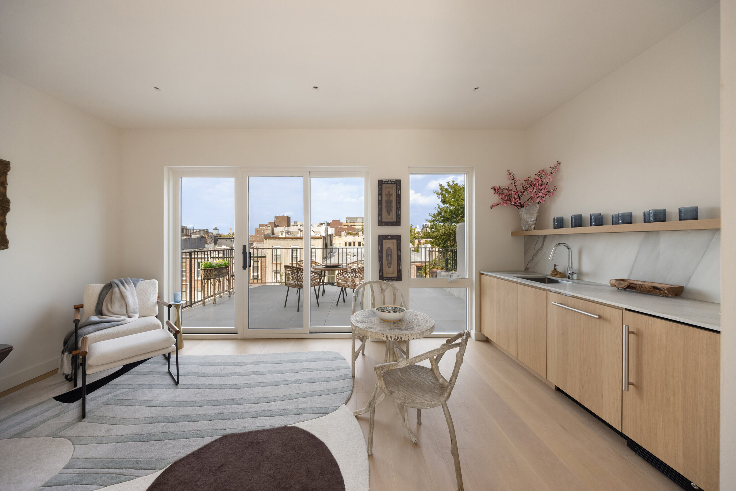 Roof-level lounge opening to the terrace at 591 10th Street