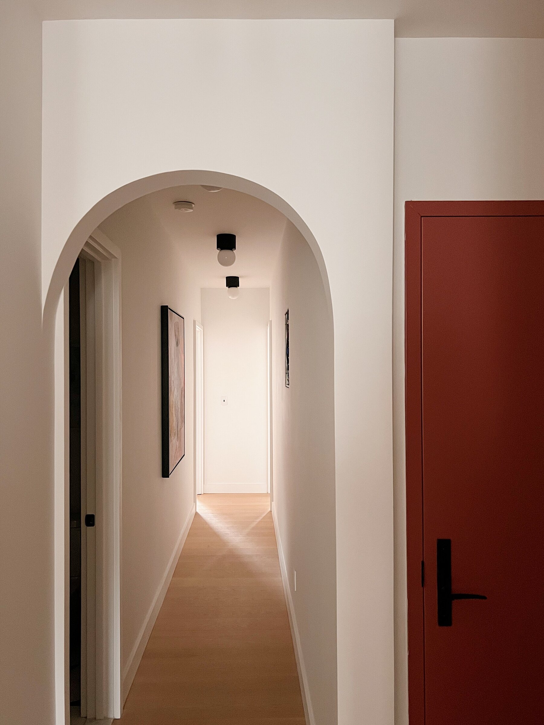 Entry hall with arched openings at 708 Degraw Street