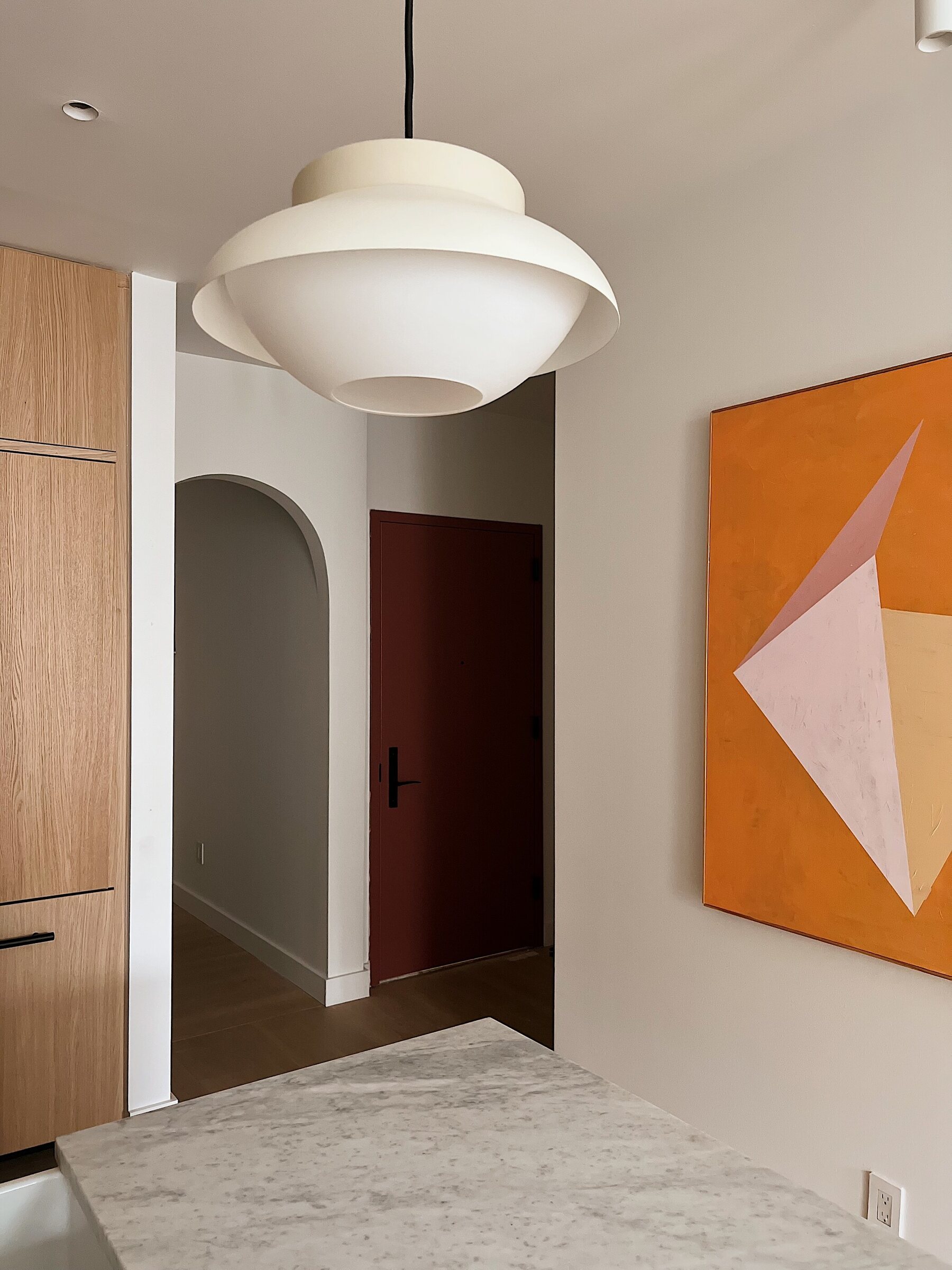 Kitchen entry and artwork at 708 Degraw Street
